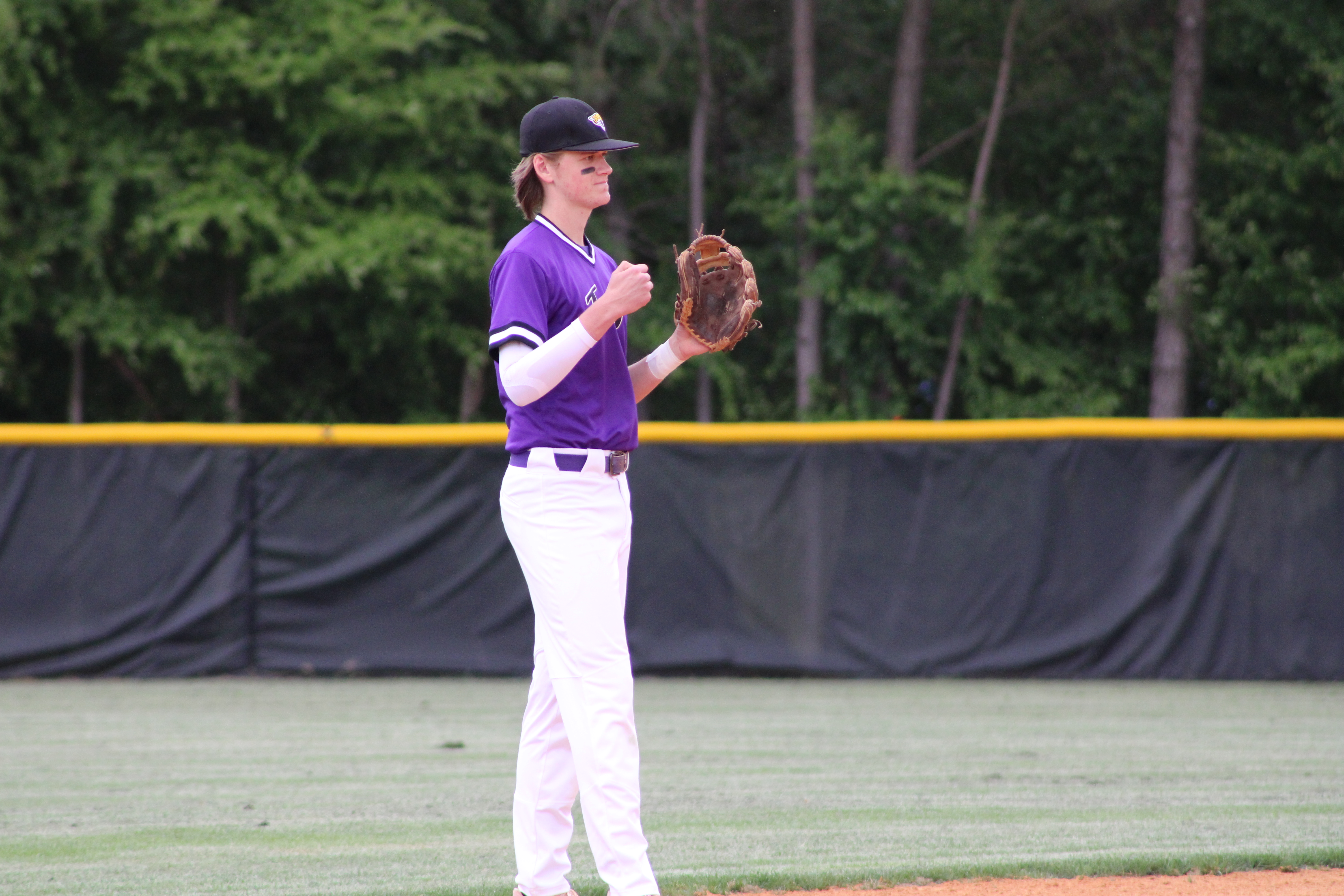 photo of Justin playing baseball